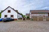 Hofzugang - Mehrfamilienhaus mit Ausbaureserve in Nauen OT